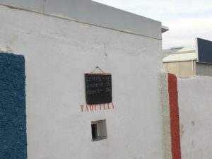 Sign advertising ticket prices at the home ground of Deportiva Minera